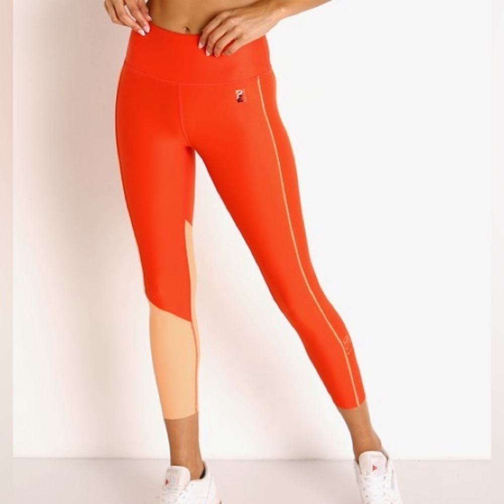 P.E NATION Cutshot High Rise Shine Orange Leggings